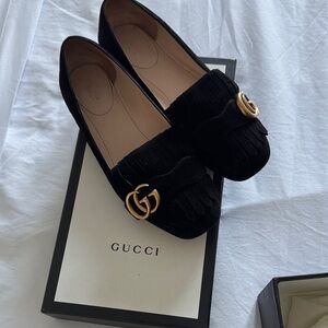 Gucci Women's Black Fringe Loafers with Gold Logo